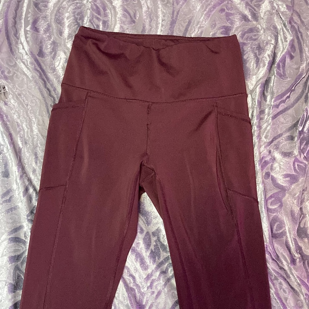 Maroon colored leggings